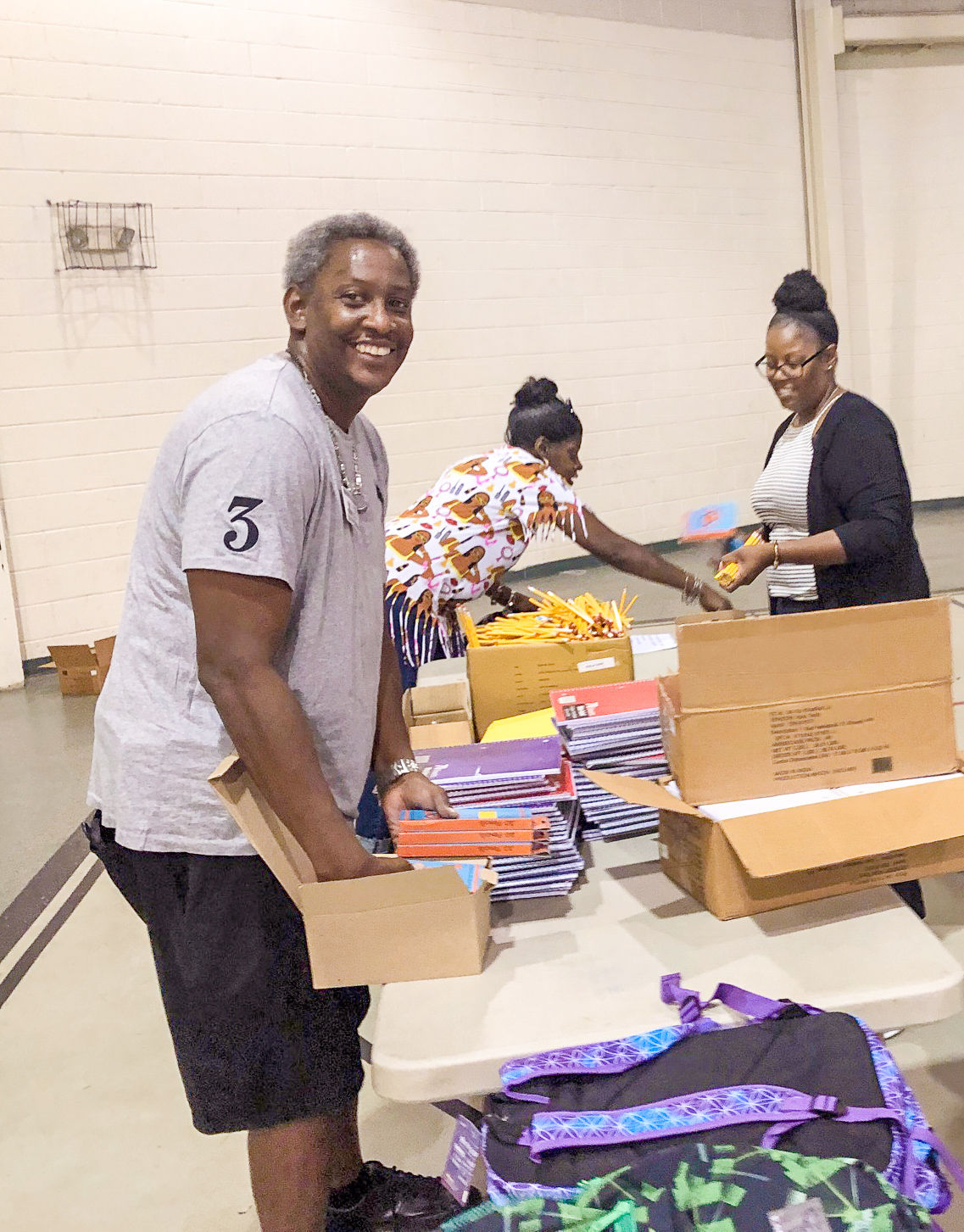 NJ Alumni & Staff Pack School Supplies for Families in Need