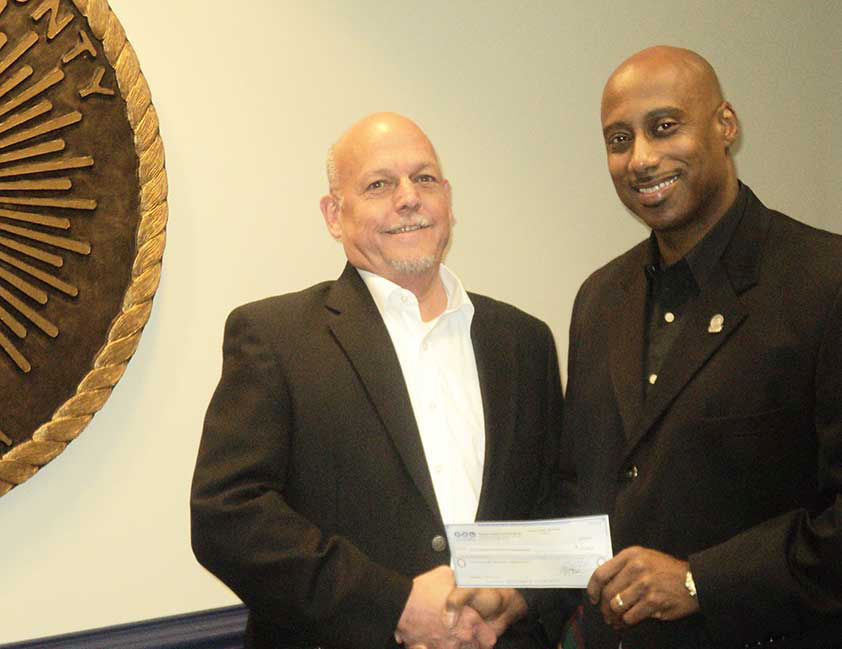 Clayton County Commissioner Chairman Jeffery Turner was Presented a $2,000 Check