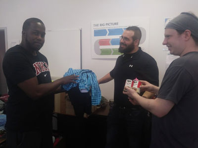 Re-entry alumni distribute to American Rescue Workers