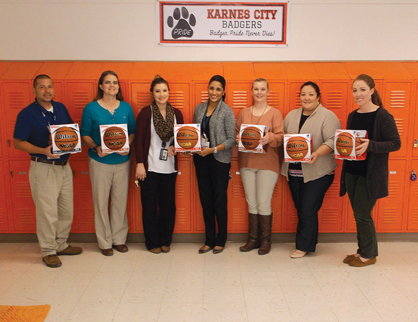 Both Karnes Centers Donated Basketballs to the Karnes City Junior High School students' team