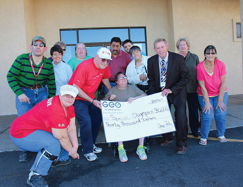Kingman Correctional and Rehabilitation Facility presented a check for $30,000 to Arizona Special Olympics